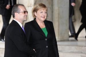 Merkel i-a cerut lui Boc banii înapoi